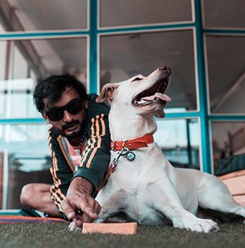 Uppakar Acharya<br> with his dog Emma